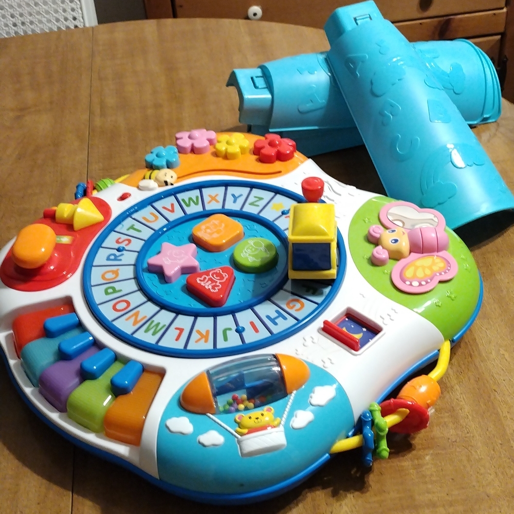 Musical alphabet and baby toys on 4 legs